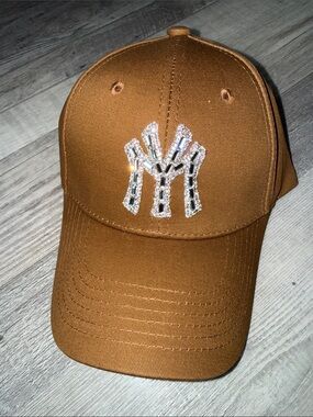 NWT .. Never worn Embellished Brown Baseball Cap with Rhinestone Logo